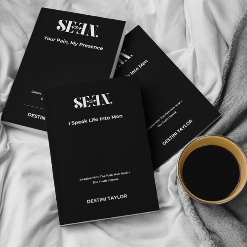 SEEN men’s healing books by Destini Taylor on a bed beside coffee